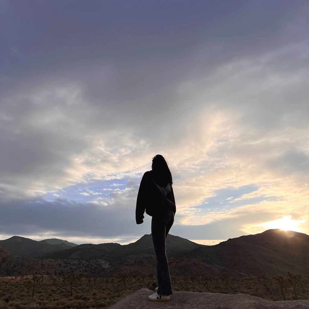 painting of woman looking down