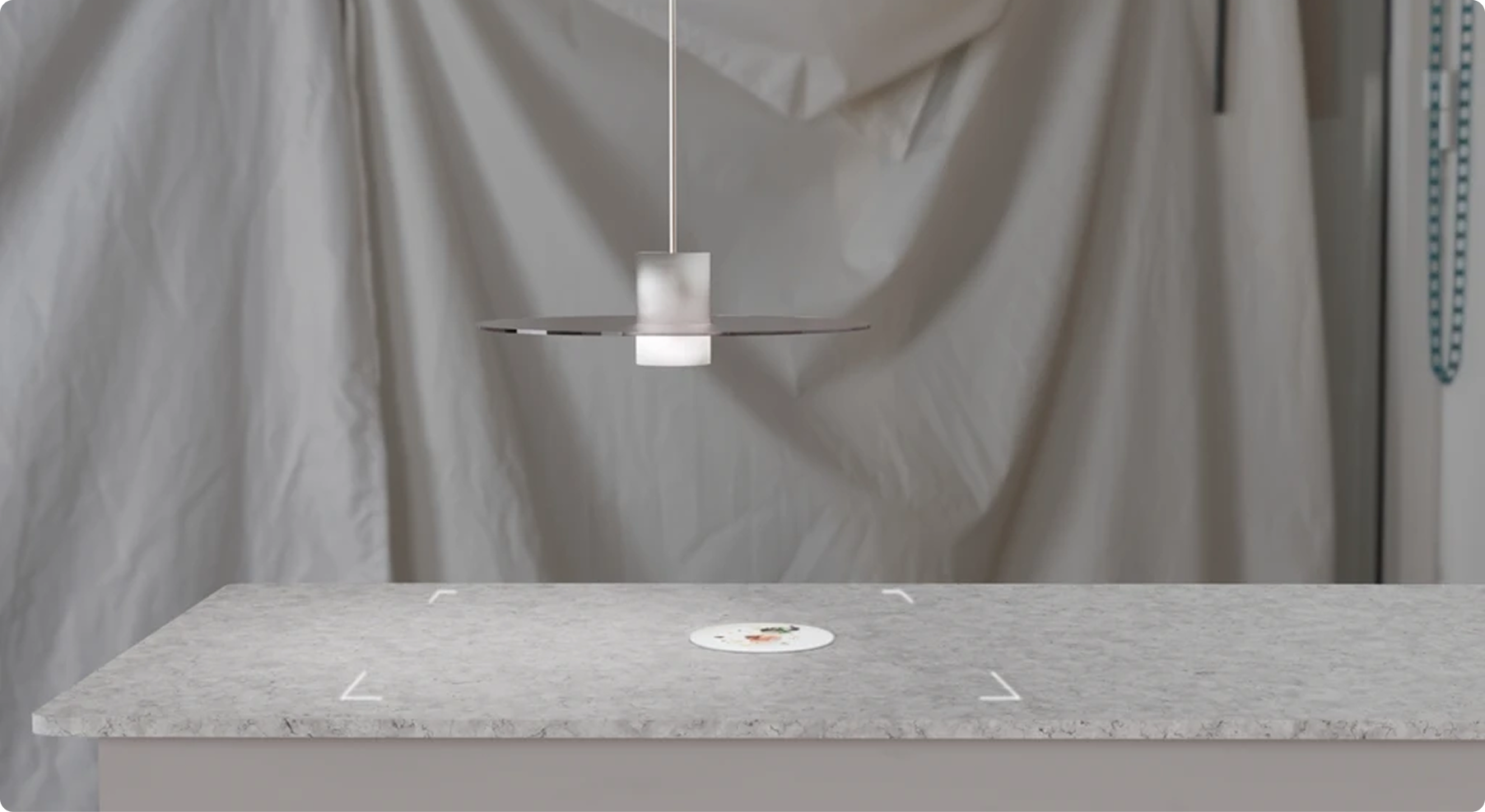 Palette Plate projecting a plating guide onto a kitchen counter
